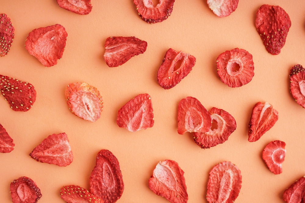Tasty,Freeze-dried,Strawberries,On,Orange,Background
