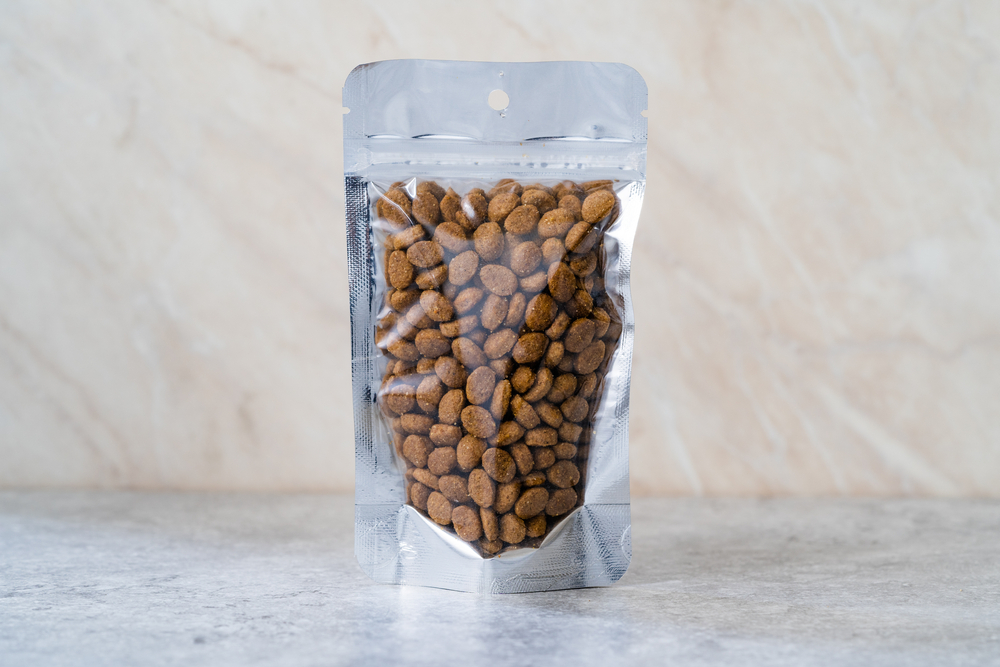 Packed,Dog,Food,For,Sale,In,Plastic,Package,Container.